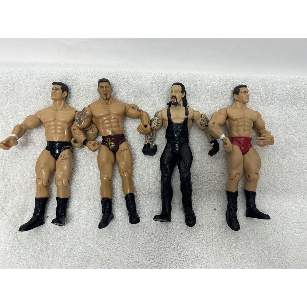 Jakks Pacific Lot of 4 WWE Randy Orton Undertaker Action Figure